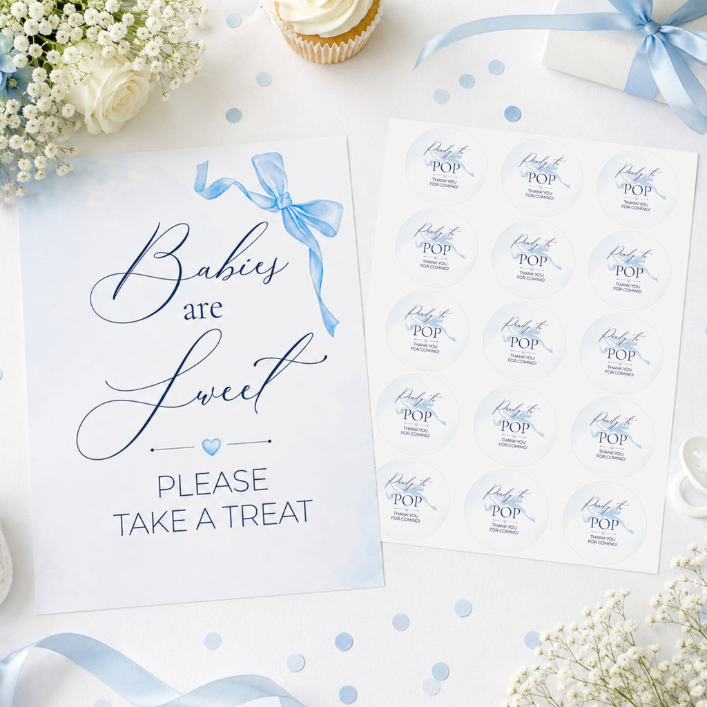 Flat lay of Blue Bow baby shower favour sign which reads 'Babies are Sweet please take a treat and 51mm Ready to Pop stickers.