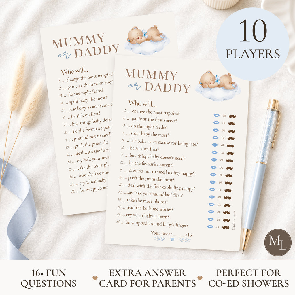 Two printed 'Mummy or Daddy' game cards laid on a white fabric surface with a blue ribbon, a gold pen, and a round badge reading '10 PLAYERS'. The cards show playful prompts, score lines, and small teddy bear illustrations.