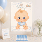 Blue teddy bear Pin the Dummy A2 baby shower poster with matching dummy stickers displayed as baby boy party decoration.