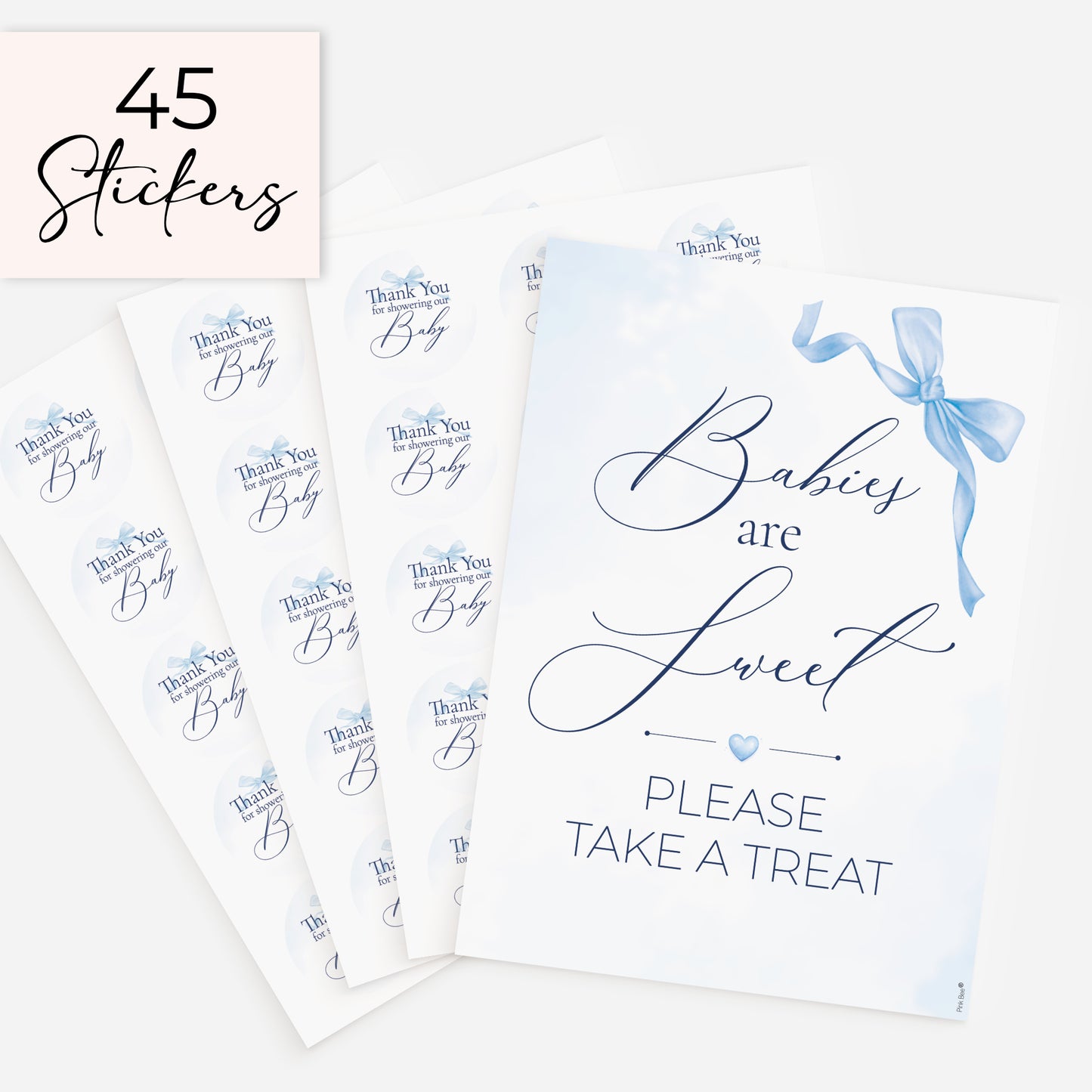 Blue bow baby shower decorations featuring favour sign and 45 matching 51mm thank you stickers for party favours and sweet treats on white background