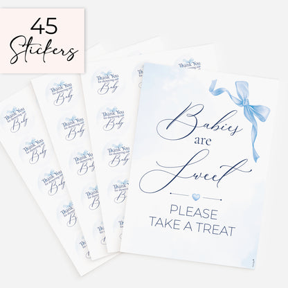 Blue bow baby shower decorations featuring favour sign and 45 matching 51mm thank you stickers for party favours and sweet treats on white background