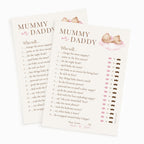 Two printed baby shower game cards titled "MUMMY or DADDY" with playful prompts, watercolor teddy bear illustrations, pink lips, and small mustache graphics on a white background.