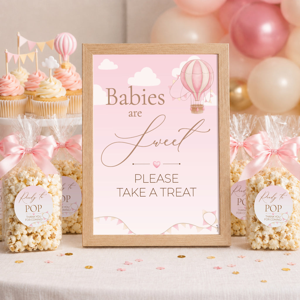 Babies are Sweet Please Take a Treat baby shower sign with large Ready to POP stickers on popcorn favour bags