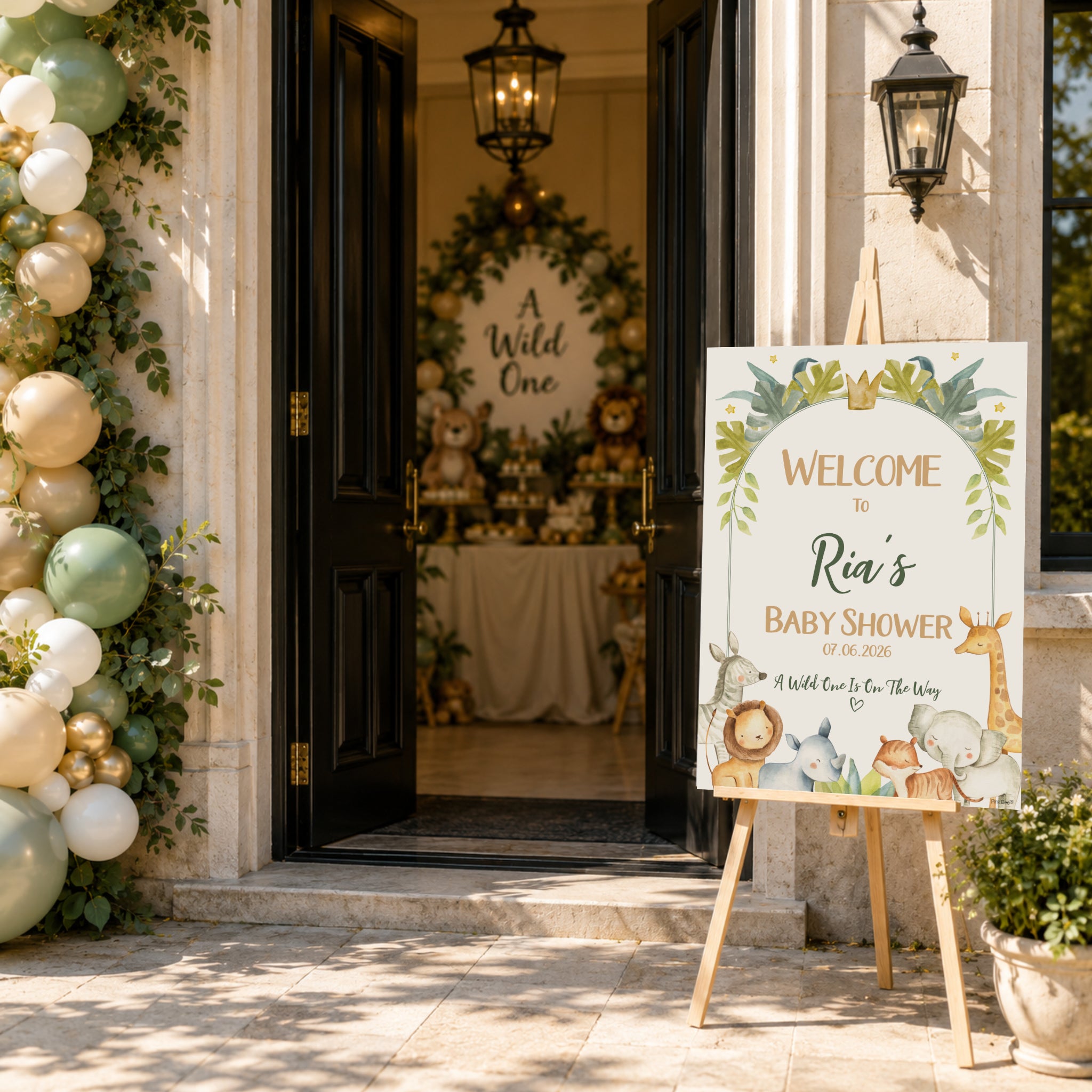Personalised Safari baby shower welcome sign outside venue entrance with safari balloon arch, jungle themed baby shower welcome board, personalised party entrance decoration.
