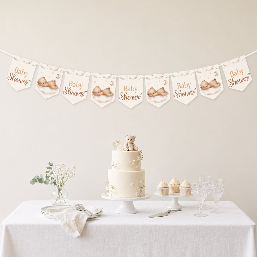 Teddy bear baby shower banner bunting displayed above a neutral baby shower dessert table with teddy cake and cupcakes.