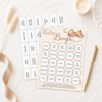 Guest playing Teddy Bear Baby Shower Bingo during a baby shower using premium large bingo card and pen.