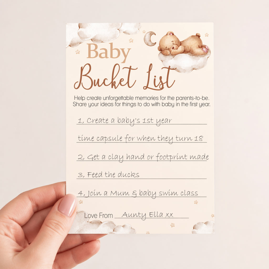 Close-up of a Teddy Bear Baby Shower Bucket List keepsake card showing completed guest ideas for baby's first year.
