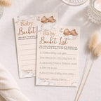 Neutral Teddy Bear Baby Shower Bucket List keepsake cards displayed on a styled baby shower table with completed guest card