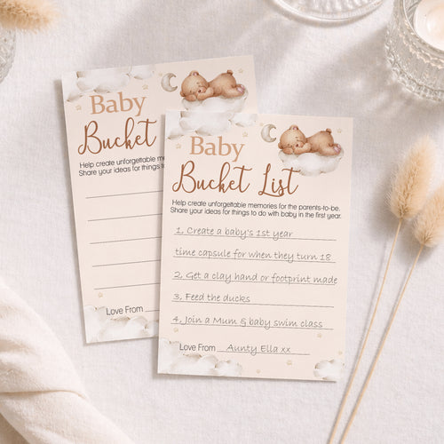 Neutral Teddy Bear Baby Shower Bucket List keepsake cards displayed on a styled baby shower table with completed guest card
