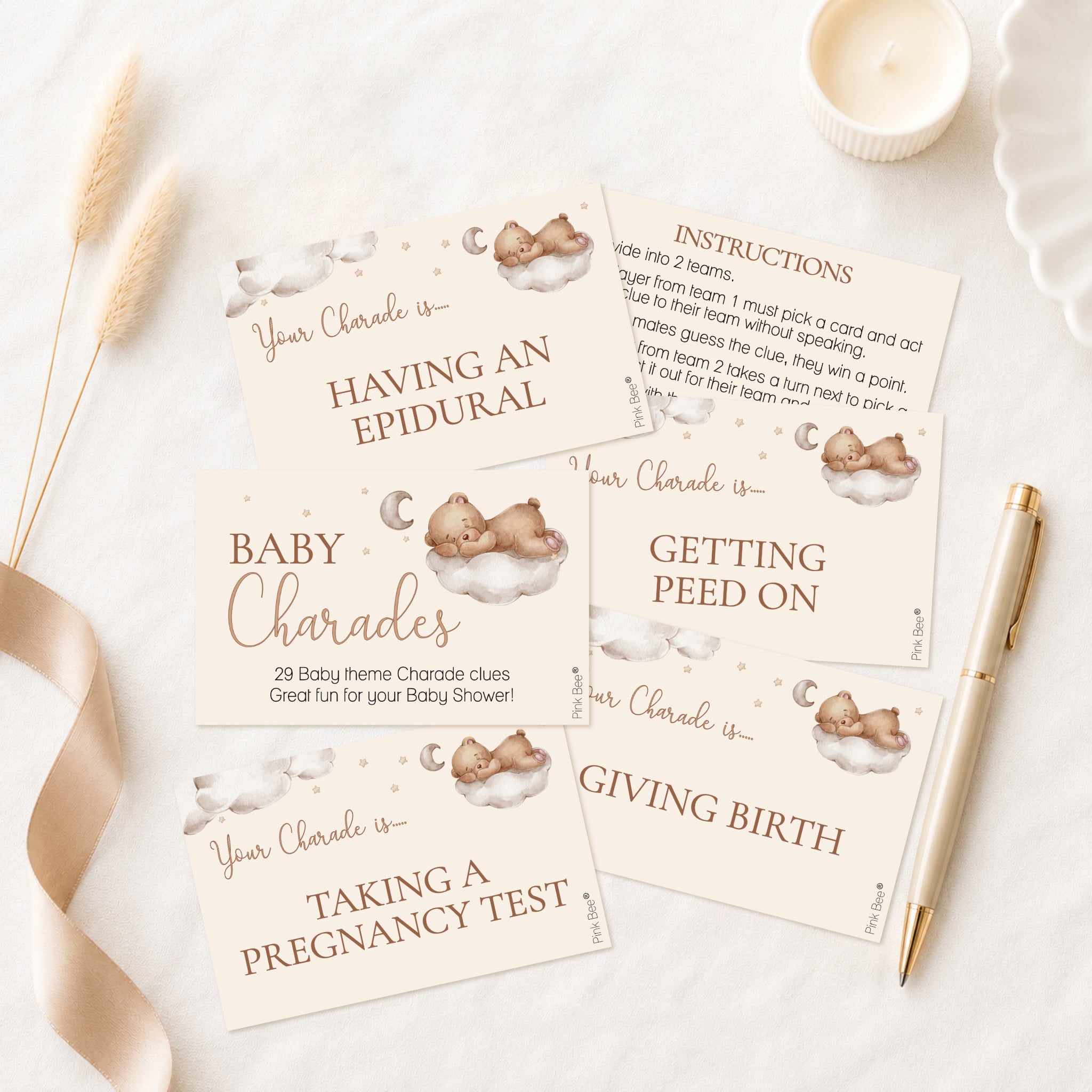 Teddy bear themed baby shower charades game including clue cards, cover card and instructions on premium printed card.
