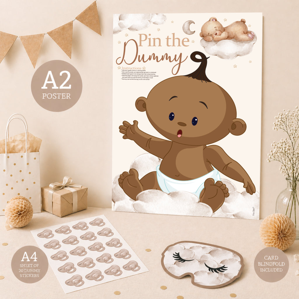 Ethnic Teddy Bear Pin the Dummy A2 baby shower game displayed with dummy stickers and included blindfold.