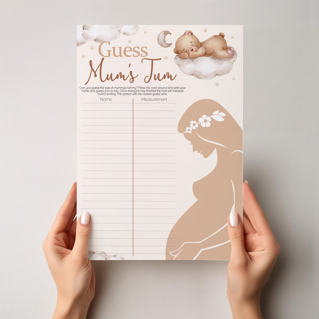 Person holding Teddy Bear Guess Mum's Tum baby shower game showing full A4 size.