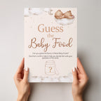 Close-up of Teddy Bear Guess the Baby Food A4 baby shower sign held in hands showing premium print quality.