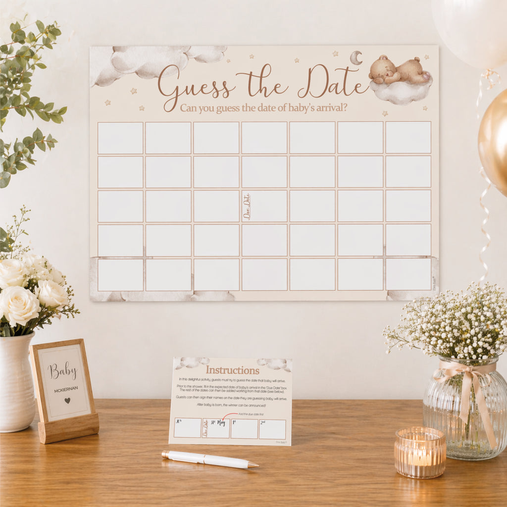 Neutral teddy bear baby shower Guess the Date A2 poster displayed on a wall above a party table with instruction card and baby shower décor.