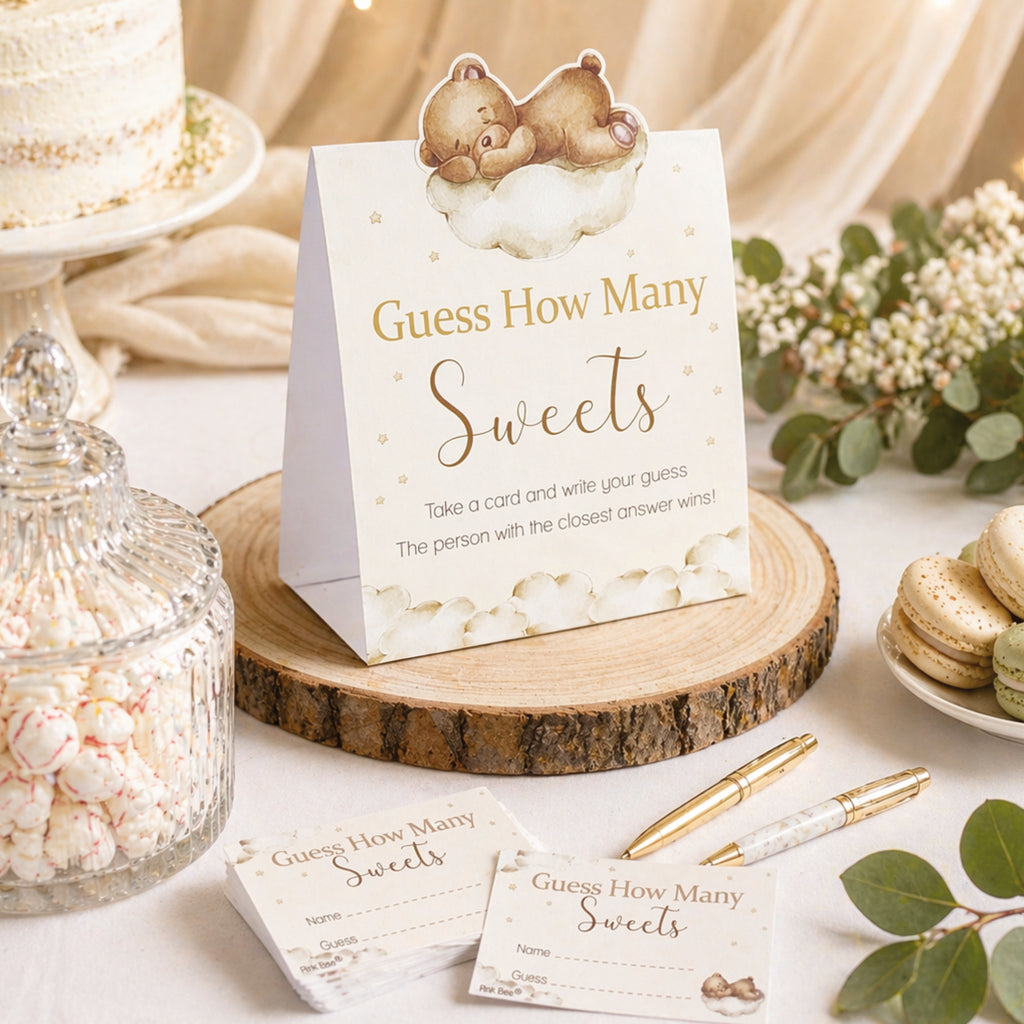 Teddy Bear Guess the Sweets baby shower game displayed beside a sweet jar with guest guessing cards on an elegant neutral teddy themed party table.