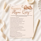 Teddy Bear Nursery Rhyme Quiz baby shower game card displayed on a neutral baby shower flat lay with pen.